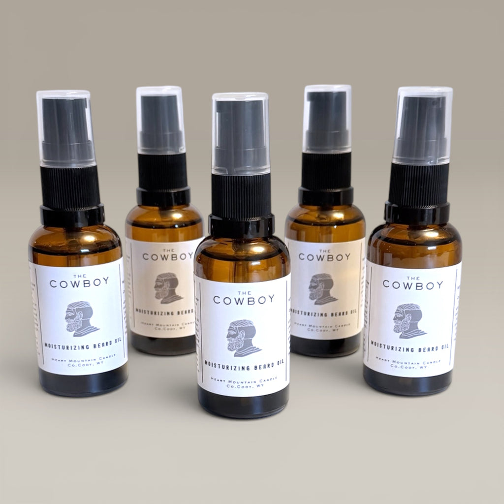 rugged cowboy beard and mustache oil gift for husband western mens grooming leather smoke beard oil handcrafted beard conditioner masculine self-care gift Fathers Day gift birthday gift for boyfriend Christmas stocking stuffer for dad beard softener for coarse beard hair warm woods beard moisturizer rustic luxury mens grooming anniversary gift for him beard care routine amber glass beard oil