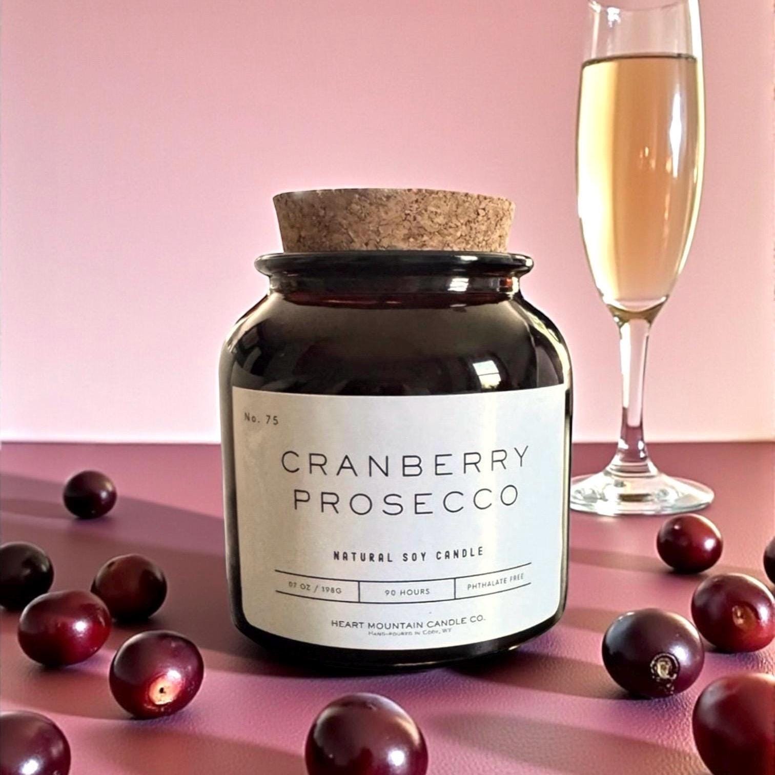 fruit scented soy candle in amber apothecary jar with natural cork lid clean burning candle with cranberry prosecco fragrance for home decor or birthday gift 80 hour burn non-toxic phthalate free luxury candle for sensitive spaces Valentine’s Day gift