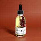 garnet infused body oil bridesmaid gift bridal shower gift wedding gift anniversary gift engagement gift housewarming gift hostess gift new home gift luxury spa oil grounding skincare non-toxic body oil hydrating dry oil frankincense cedarwood body oil spa inspired skincare crystal infused body oil elegant wellness gift handcrafted botanical skincare smooth glowing skin self-love gift