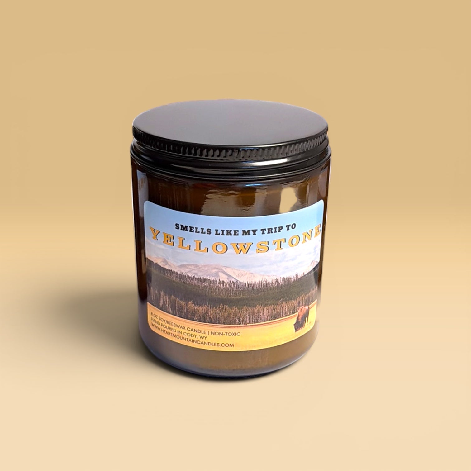 Outdoors inspired Yellowstone candle with earthy wilderness scent profile featuring trees dirt woods and crisp mountain air amber jar candle for cozy cabin styling and rustic lodge decor perfect gift for Yellowstone lovers national park collectors travelers and camping enthusiasts ideal Christmas gift birthday gift Father’s Day gift gift for boyfriend gift for husband housewarming gift travel gift and rustic masculine candle for nature inspired homes