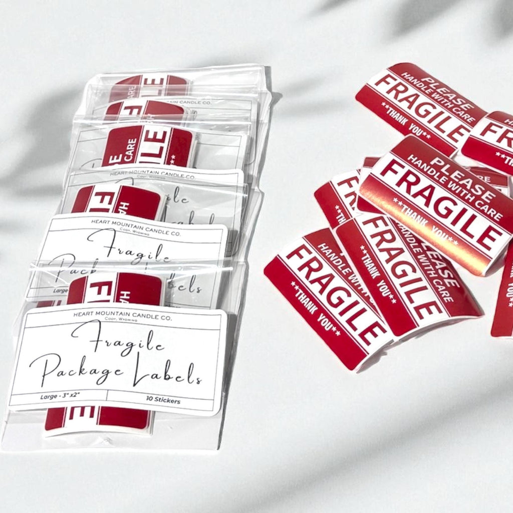 fragile shipping labels red and white handle with care stickers adhesive labels for shipping boxes packaging labels for mailing boxes small business supplies moving labels high visibility strong adhesive 3x2 inch size easy peel liner water resistant fade resistant for ecommerce fulfillment warehouse packing stations
