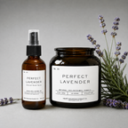 A Perfect Lavender room spray bottle and candle jar, styled with fresh lavender sprigs.