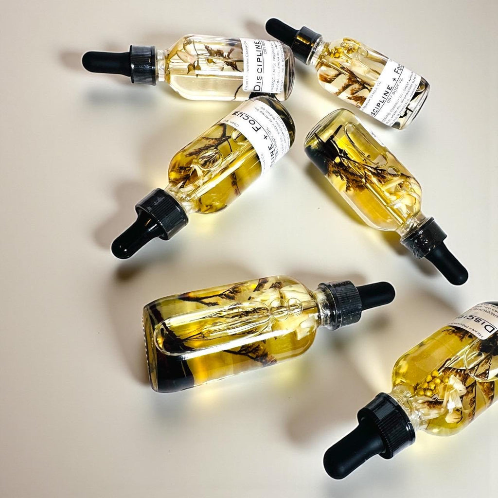Discipline and focus hematite infused body oil crystal infused manifestation body oil intentional dry body oil organic skincare body oil natural ingredient skincare oil clean beauty skincare healthier skincare alternative moisturizing body oil nourishing skin oil grounding energy alignment body oil focus ritual body oil spiritual wellness self-care oil handmade organic skincare birthday gift self-care gift housewarming gift mothers day gift valentines gift christmas gift wedding gift hostess gift