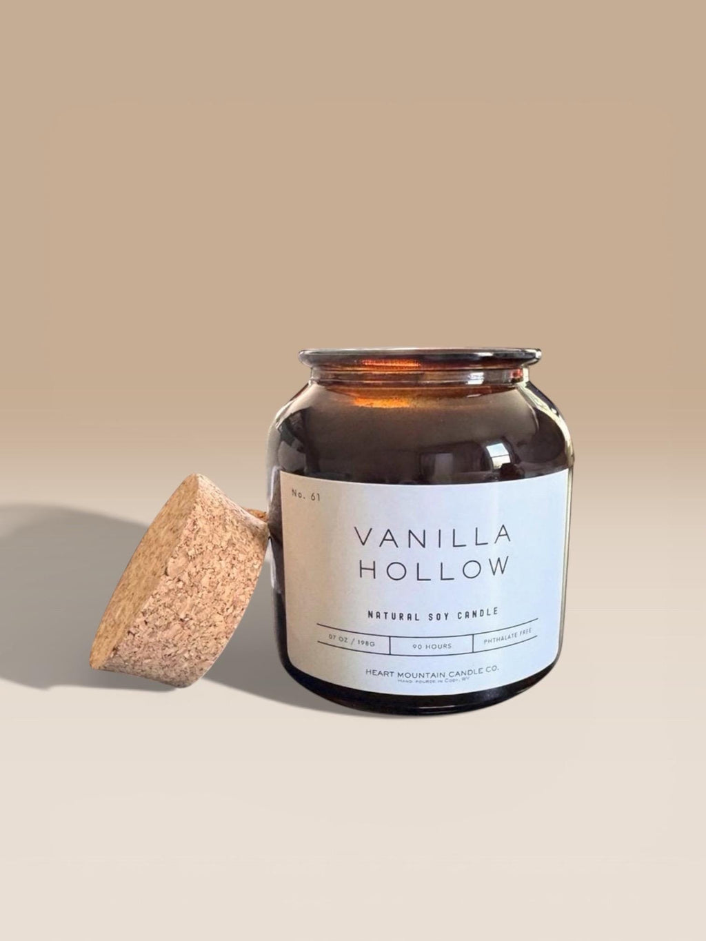 Hand-poured Vanilla Hollow soy candle in amber jar with soft vanilla, lavender, and smoky musk scent clean burning candle for gifting, self-care, or intimate evenings at home