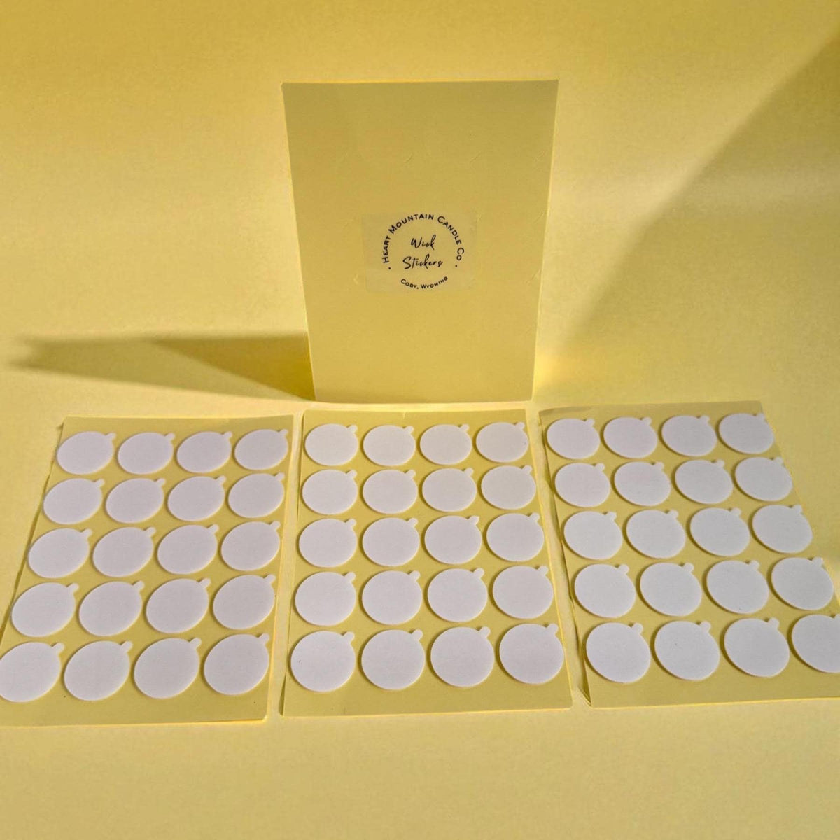 Double-sided adhesive wick stickers for candle making