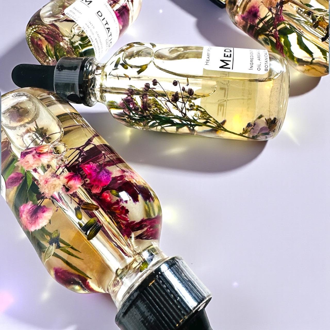 meditation and sleep body oil christmas gift stocking stuffer spa gift gift for her self-care gift relaxation gift wellness gift luxury body oil dry body oil non-greasy body oil crystal infused body oil amethyst body oil hydrating skincare glowing skin oil lavender chamomile body oil handcrafted skincare cody wyoming luxury spa oil calming skincare intentional living gift