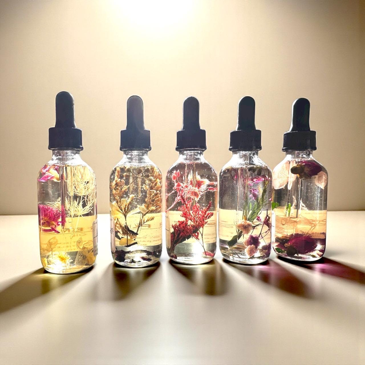 inner strength grounding botanical oil garnet infused hydrating natural dry oil lightweight non greasy sweet almond coconut blend glowing skin product grounding essential oil aroma ideal for emotional balance and confidence supporting morning rituals luxury plant based wellness oil nourishing body care elegant bottle grounding blend designed for stability resilience and intentional self care