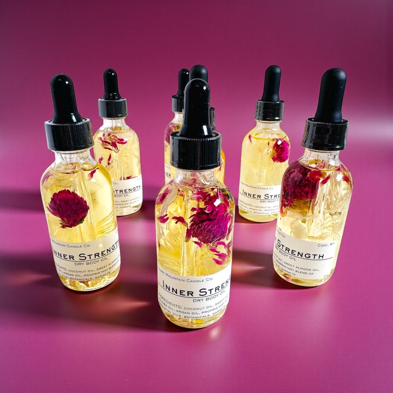 Inner strength garnet infused dry body oil manifestation ritual body oil intentional body oil crystal infused skincare oil organic skincare body oil natural skincare oil clean beauty skincare healthier skincare option moisturizing body oil spiritual wellness oil grounding self-care ritual oil birthday gift self-care gift housewarming gift mothers day gift valentines gift christmas gift wedding gift hostess gift