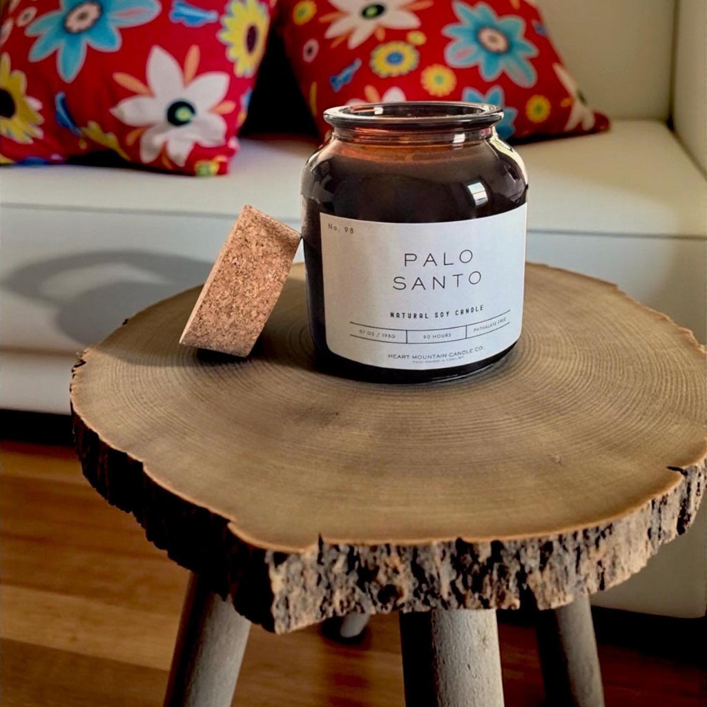 palo santo candle palo santo scented candle christmas gift stocking stuffer secret santa gift holiday candle gift for her gift for him birthday gift housewarming gift grounding candle clean burning candle non-toxic candle soy wax candle beeswax candle amber jar candle smoky wood candle cedarwood candle luxury candle handcrafted candle hand poured candle calming home fragrance candle artisan candle thoughtful self-care gift cody wyoming candle