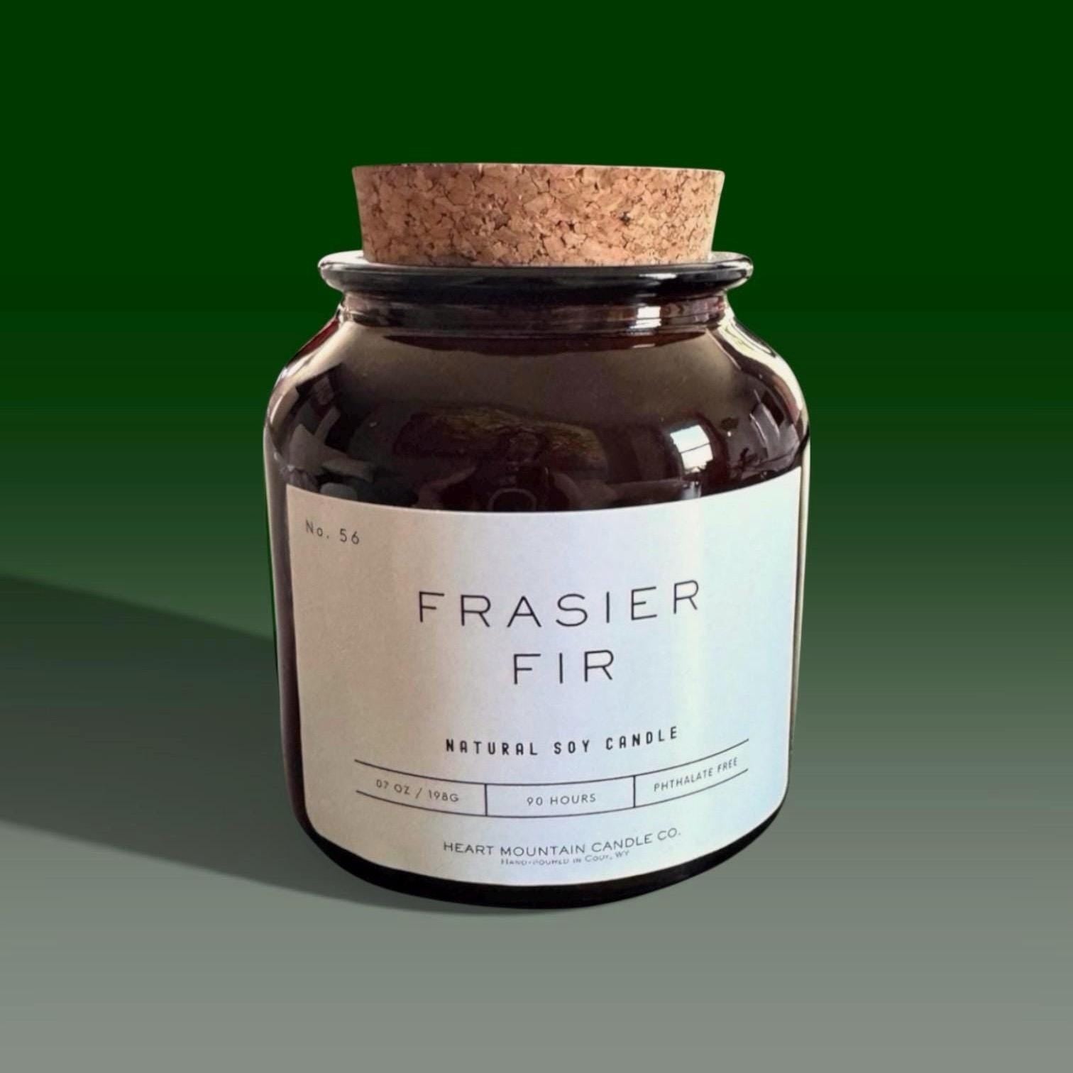 Amber jar soy candle with fresh Frasier Fir evergreen top notes and soft cedarwood base clean burning luxury candle for gift for her or him cozy winter cabin home decor soothing aromatic fragrance