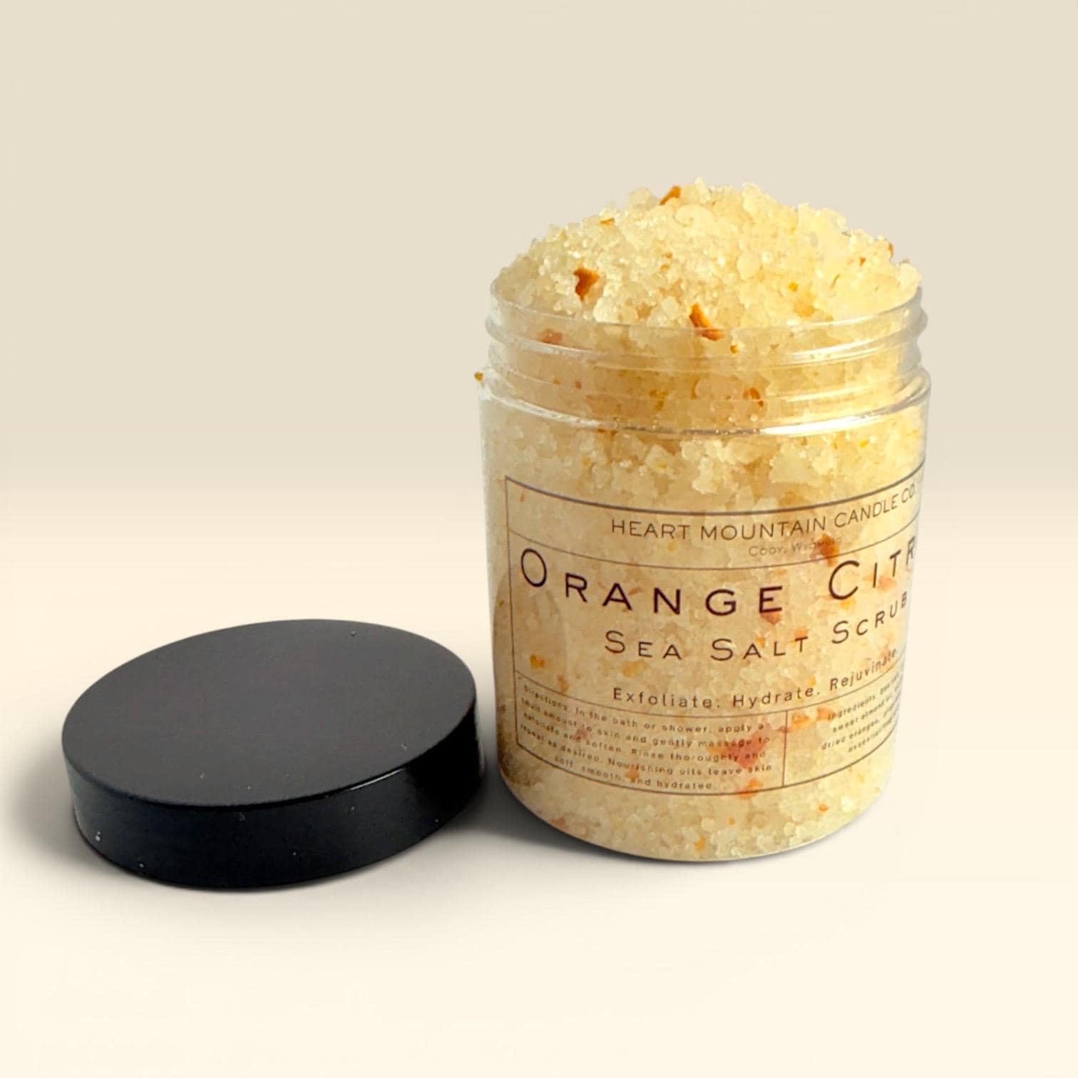 citrus body scrub orange exfoliating body polish hydrating salt body treatment natural skincare exfoliator skin smoothing routine self care gift spa body treatment glowing skin coarse salt scrub sweet almond oil coconut oil sunflower oil nourishing exfoliating skincare citrus body care bath routine relaxing spa gift soft smooth skin exfoliation treatment glowing skin routine natural body polish