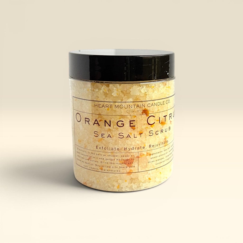orange citrus body scrub exfoliating body polish hydrating salt scrub natural body exfoliator skin smoothing treatment self care gift spa body scrub glowing skin routine bath body product coarse sea salt scrub sweet almond oil coconut oil sunflower oil body care citrus skincare gift for her hydrating exfoliating treatment smooth skin body polish natural skincare gift spa experience relaxing bath routine soft glowing skin